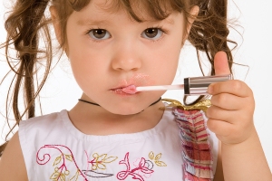 bigstock-Adorable-little-girl-applying-17555462